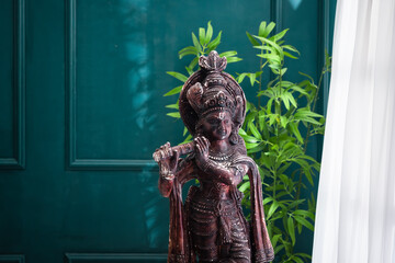 Lord Krishna sculpture, Happy Janmashtami and Vishu greeting	