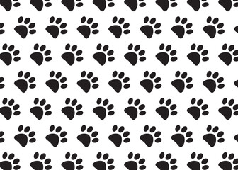 Fototapeta premium Seamless pattern with paw.Dog foot steps repeat pattern.Vector graphic puppy symbol.