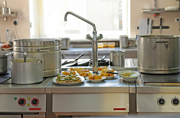 kitchen: gas-stoves, cooking utensils set on kitchen desk