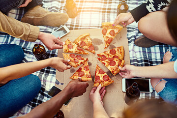 Hands, friends and pizza outdoor for picnic while hanging out, chilling and bonding together with...