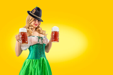 Oktoberfest girl waitress. Woman in dirndl, tyrolean hat serving big beer mugs on isolated...