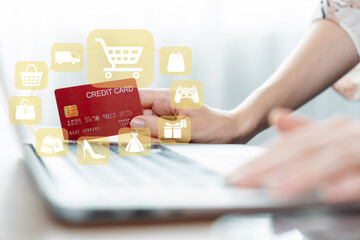 Elegant customer hold credit card with hologram interface choose online platform. Smart consumer...