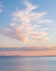 Harmony in Hues: Sunset Embrace of Pink Cirrus Clouds
