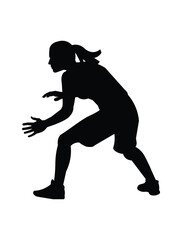 Black silhouette of a women's basketball girl player who blocks shot of the ball from being thrown into a basket