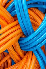 Abstract background in blue and orange colors of network patchcords. Technology and communications.