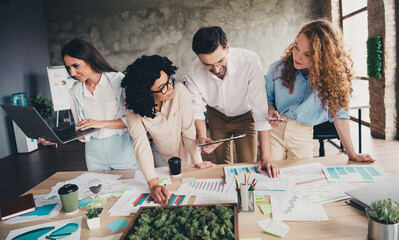 Photo of business strategy teamwork young people working together employees modern industrial open space style interior workplace