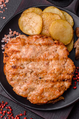 Delicious juicy turkey or chicken steak with salt, spices and herbs