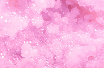 Amethyst pink crystals. Gems. Mineral crystals in the natural environment. Texture of precious and semiprecious stones. Seamless background with copy space colored shiny surface of precious stones.