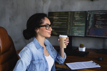 Profile portrait of young girl it specialist sit chair drink coffee think loft interior business...