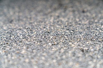 Cat litter granules close up. The texture of granular toilet filler. Cat litter in granules box. active carbon. texture pattern. Clean Cat litter in a litter tray. Background of white bentonite fresh 