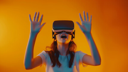 A girl wearing a VR headset, her hands raised in excitement, set against a vibrant orange background