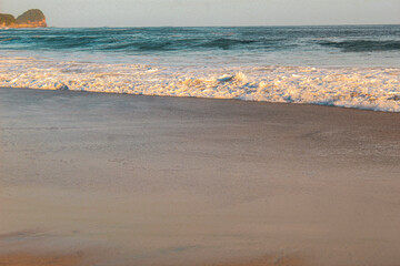 Beautiful view of sea waves on the beach, sunset shot