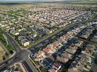 aerial view of a middle class brand new residential houses neighborhood in a city suburbs. suburbia,