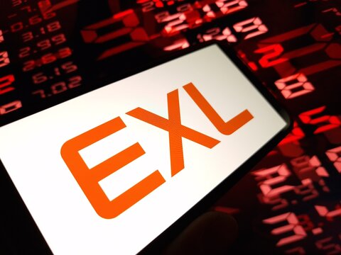 Konskie, Poland - May 10, 2024: EXL Service company logo displayed on mobile phone