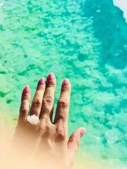 Hand Reaching for Serene Slot Lake