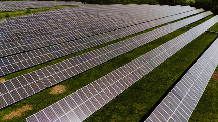 Aerial view of photovoltaic solar panels for renewable electric production.