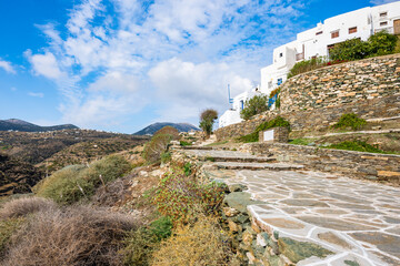 White houses on coastal path along sea in Kastro village, Sifnos island, Greece