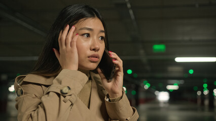 Stressful Asian woman girl talk phone angry annoyed businesswoman call smartphone solve business...