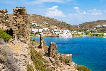 Ruins of old medieval houses on sea coast of Marina Gialos bay, Sifnos island, Greece