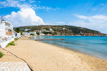 Azure sea and sandy beach in Platis Gialos village, Sifnos island, Greece