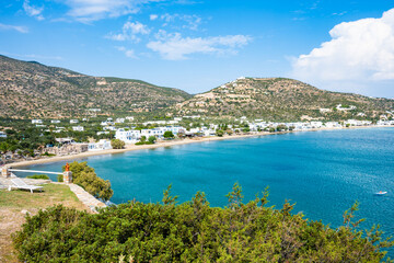 View of azure sea bay and sandy beach in Platis Gialos village, Sifnos island, Greece