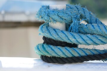 Blue rope for a boat by the sea pattern nautical background