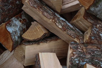 stack of firewood in the yard as a background