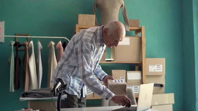 sme business ideas concept. Starting SME owner male entrepreneur check online orders, sell to customers