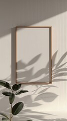 elegant, thin, wooden frame with a white blank canvas, the frame hanging on a white wall