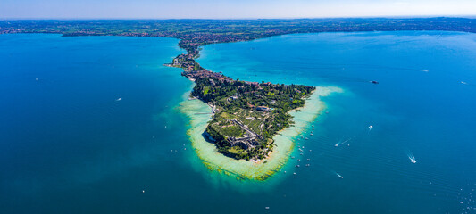 Aerial View of Sirmione Peninsula on Lake Garda, Italy, Showcasing Turquoise Waters and Vibrant Lakeside Town