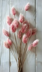 Pink Flowers in Vase on Wooden Table