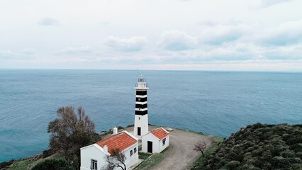 Historic lighthouse on a cloudy day