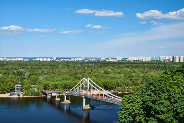 Top view of the Dnipro River and the pedestrian bridge to Trukhanov Island in Kyiv, Ukraine.