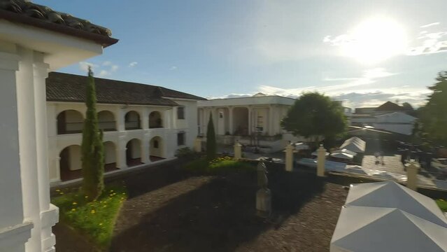 Popayan town in Colombia, close to Cali its a beautiful colonial town in white buildings and roofs that combine very good with the view from the air, drone scenes all over town and the sky, 