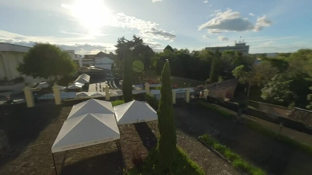 Popayan town in Colombia, close to Cali its a beautiful colonial town in white buildings and roofs that combine very good with the view from the air, drone scenes all over town and the sky, 