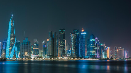 Fototapeta premium The skyline of Doha, Qatar during night