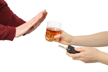 Man refusing alcoholic drink while woman suggesting him car keys and glass of whiskey on white...