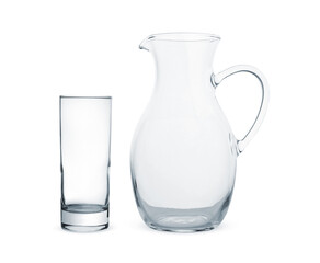 Empty glass and jug isolated on white