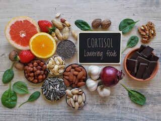 Foods to naturally lower cortisol levels, reduce stress and anxiety. Healthy foods to lower cortisol. Foods to decrease cortisol and stress levels. Cortisol lowering foods, healthy diet concept.