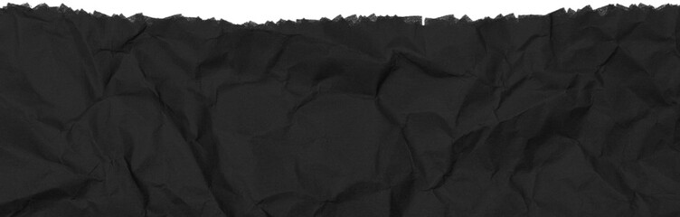 Piece of black, torn, crumpled paper. Torn paper decorative element. Ripped paper sheet.