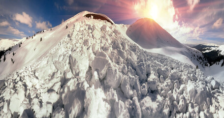 a powerful avalanche fell from an alpine slope in the Ukrainian Carpathians, huge blocks of snow...