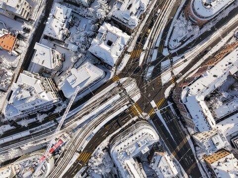 aerial view of a junction in a city during winter