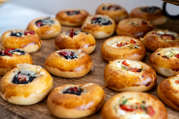 coffee break hotel during conference meeting, corporate revent with tea and coffee catering, decorated catering banquet table with variety of different pastry and bakery, with croissants and cookies