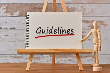 There is notebook with the word Guidelines. It is as an eye-catching image.