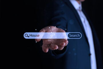 Real estate agent holding virtual search bar with word House on black background, closeup