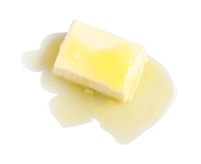 Piece of melting butter on white background, top view