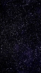 Obraz premium A dark sky background with stars, creating an atmosphere of mystery and wonder. 