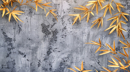 golden bamboo leaves on gray cement texture,Abstract background