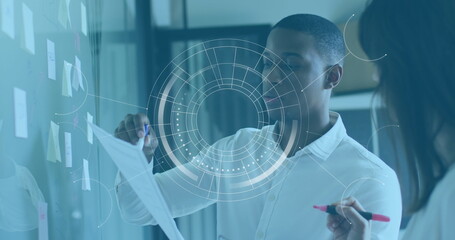 Black marketer & white design chief review business charts.