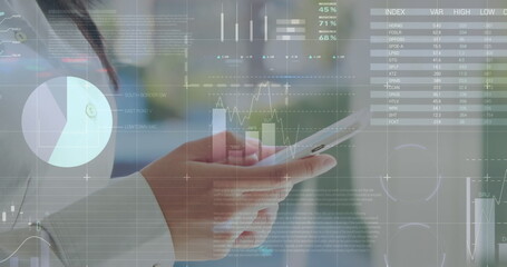 Statistical data processing against asian businesswoman using smartphone at office